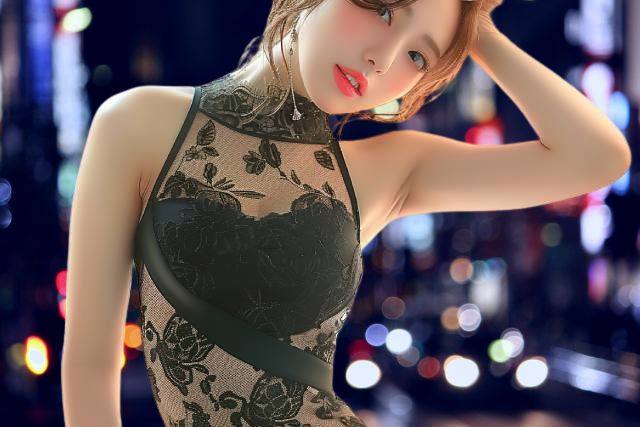 夜景を背景にポーズを決めるドレス姿の若い女性