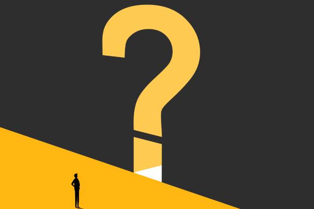 クエスチョンマークと立っている人物のイラスト
