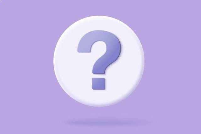 紫の背景にあるクエスチョンマーク