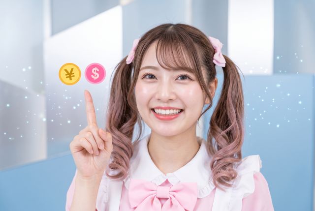 お金のマークを指さすメイド服の女性